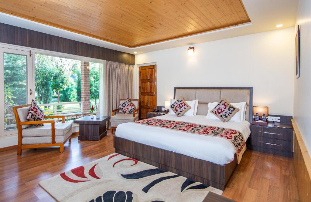 Postel nebo postele na pokoji v ubytování The Orchard Retreat & Spa