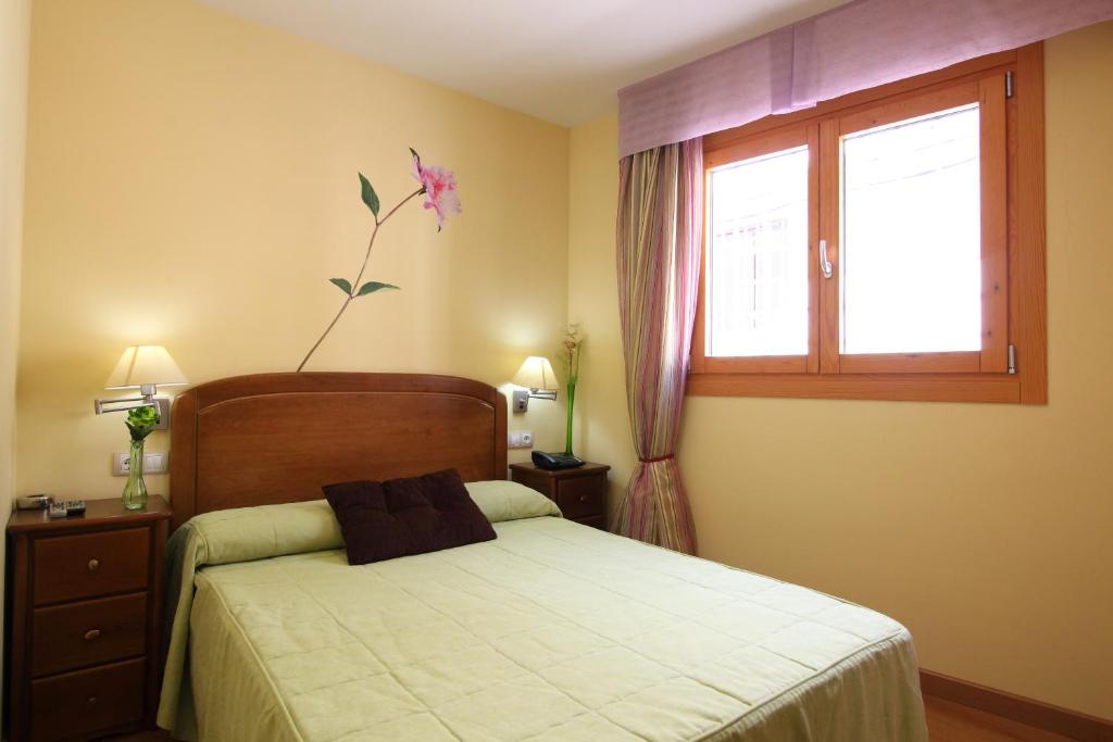 Postel nebo postele na pokoji v ubytování Hostal Campo Real Bed&Breakfast