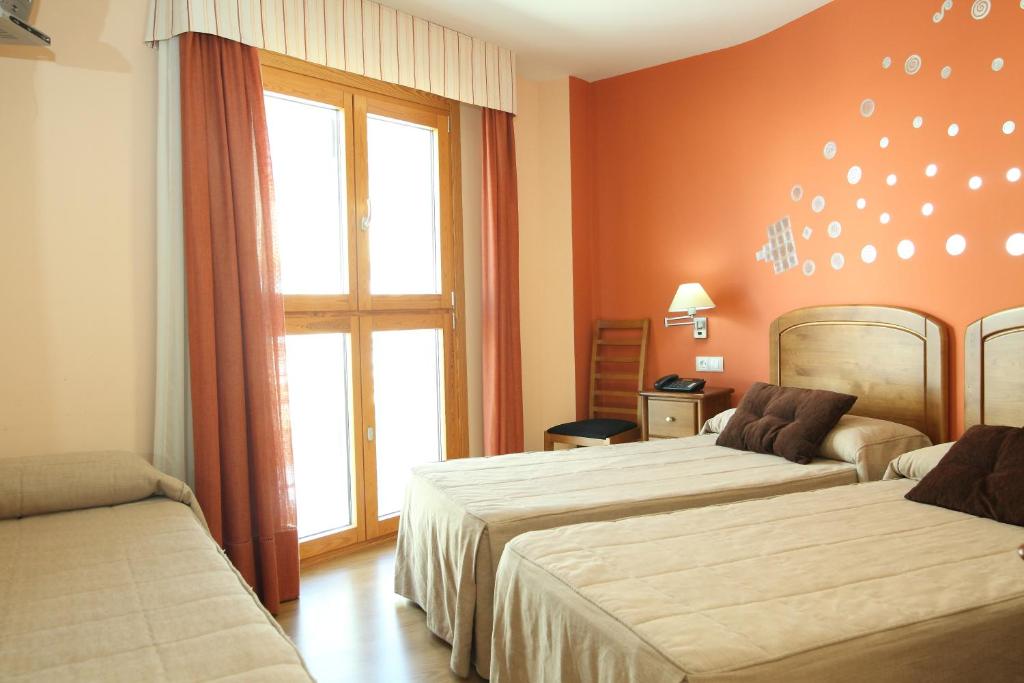 Postel nebo postele na pokoji v ubytování Hostal Campo Real Bed&Breakfast