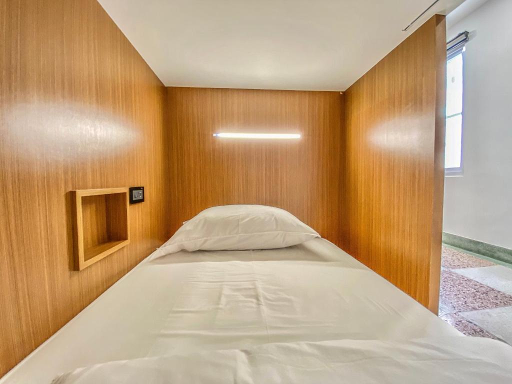 Postel nebo postele na pokoji v ubytování De Provintia Straat B&B
