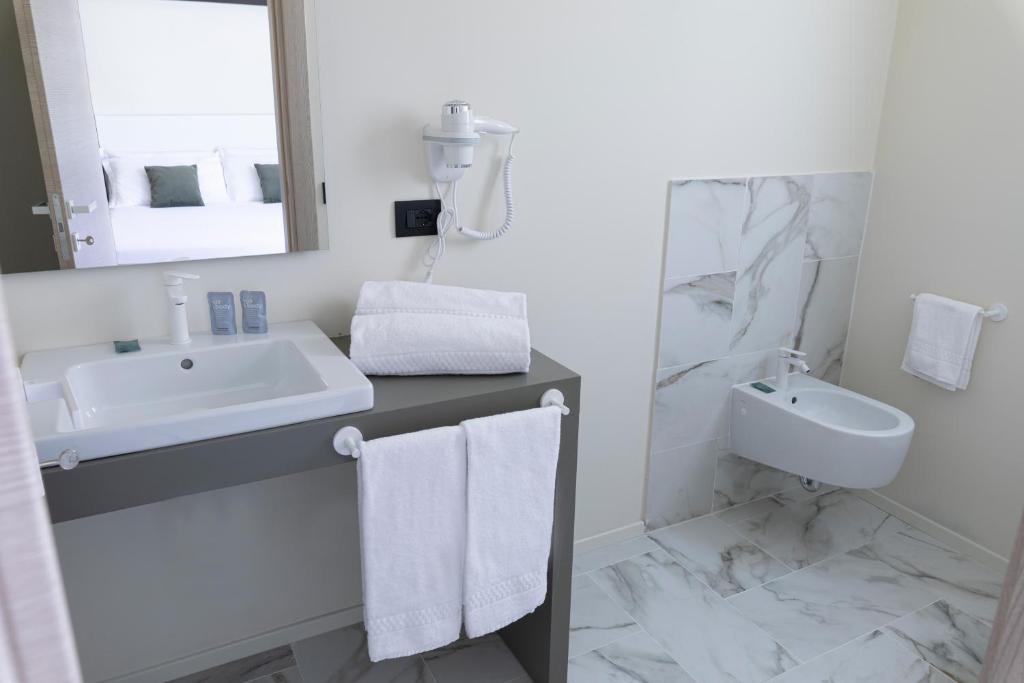 Koupelna v ubytování Pietra Bianca Hotel