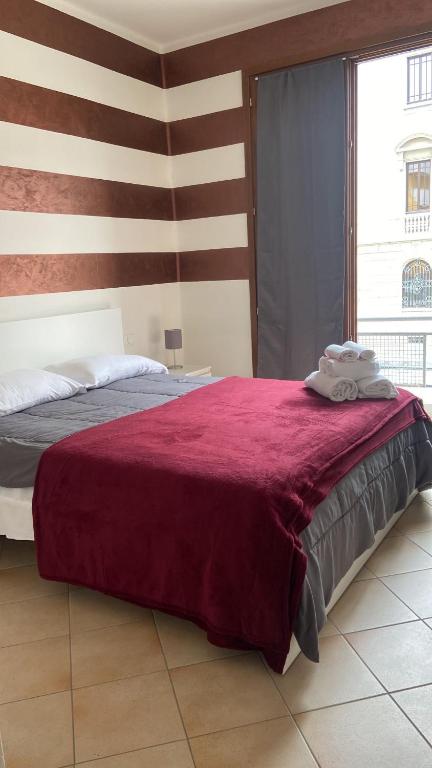Postel nebo postele na pokoji v ubytování ALBERGO 900Strati