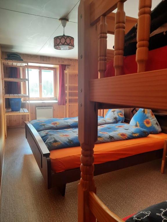 Postel nebo postele na pokoji v ubytování Bio Yak Hof Heinz