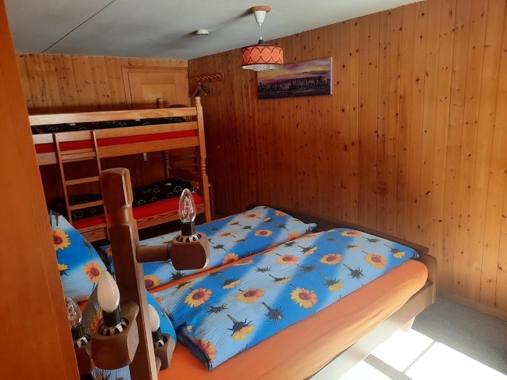 Postel nebo postele na pokoji v ubytování Bio Yak Hof Heinz