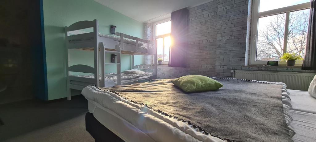 Letto o letti in una camera di Harz Hostel
