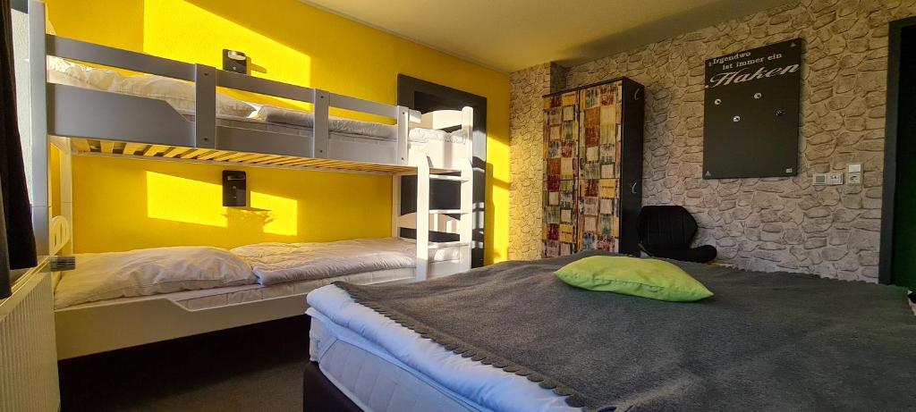 Letto o letti in una camera di Harz Hostel