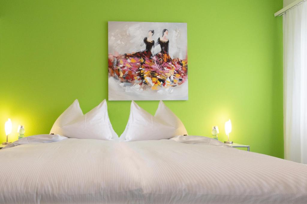 Postel nebo postele na pokoji v ubytování Hotel Bären Niederscherli