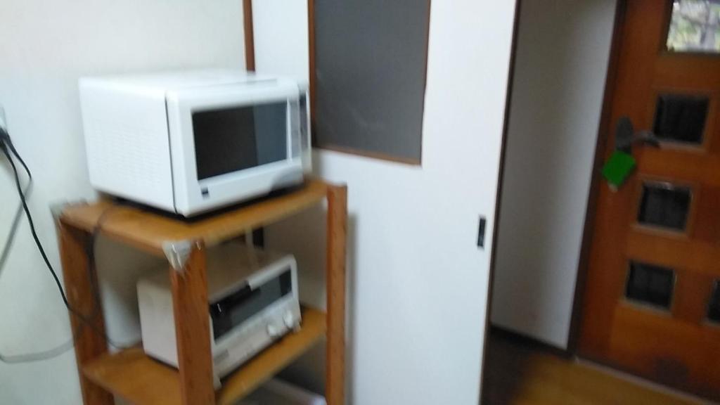 Cucina o angolo cottura di コウノトリの里の宿
