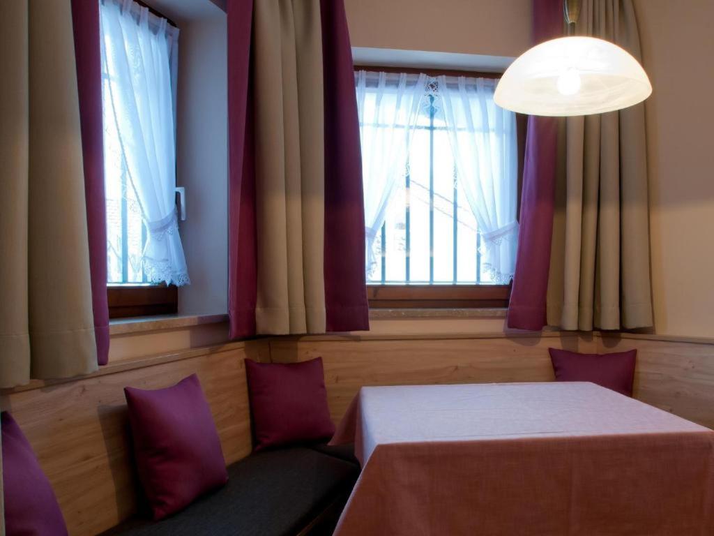 Postel nebo postele na pokoji v ubytování Hotel-Gasthof Sperrer