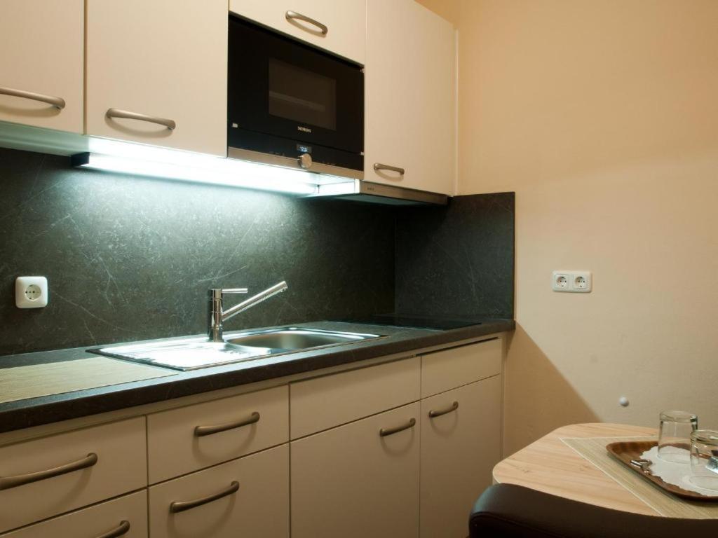 Kuchyň nebo kuchyňský kout v ubytování Hotel-Gasthof Sperrer