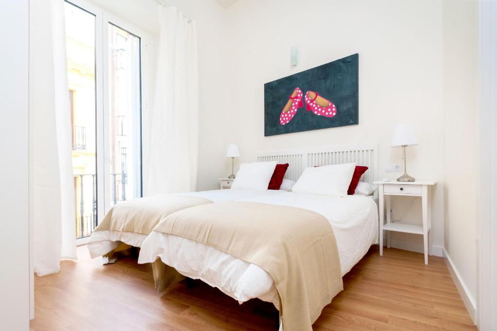 Posteľ alebo postele v izbe v ubytovaní Genteel Home Zaragoza