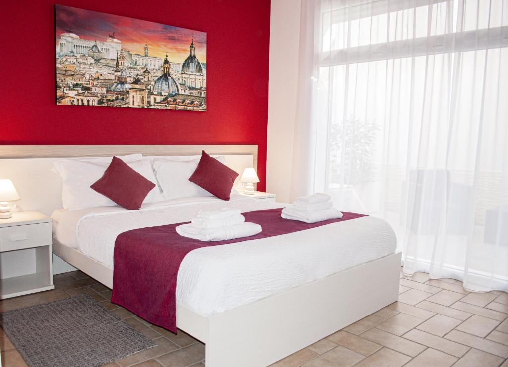 A bed or beds in a room at Borgo San Lorenzo Roma