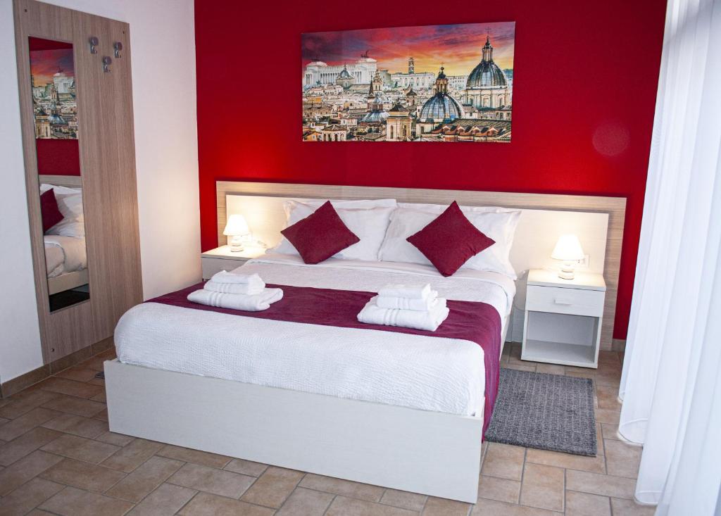 A bed or beds in a room at Borgo San Lorenzo Roma