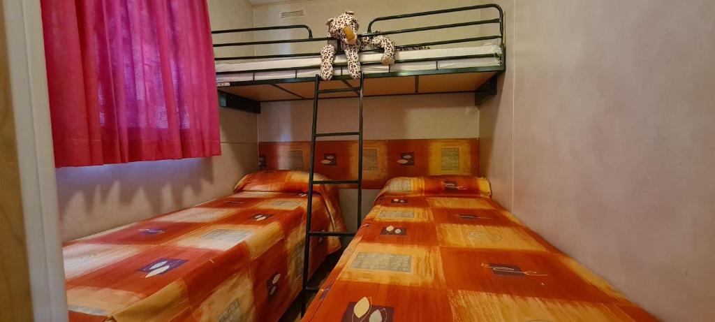 Postel nebo postele na pokoji v ubytování Villaggio Acquamarina