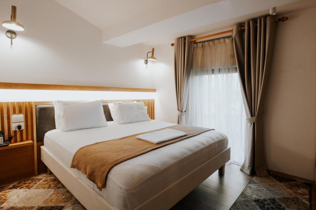 Uma cama ou camas num quarto em Sharm Hotel Luxury