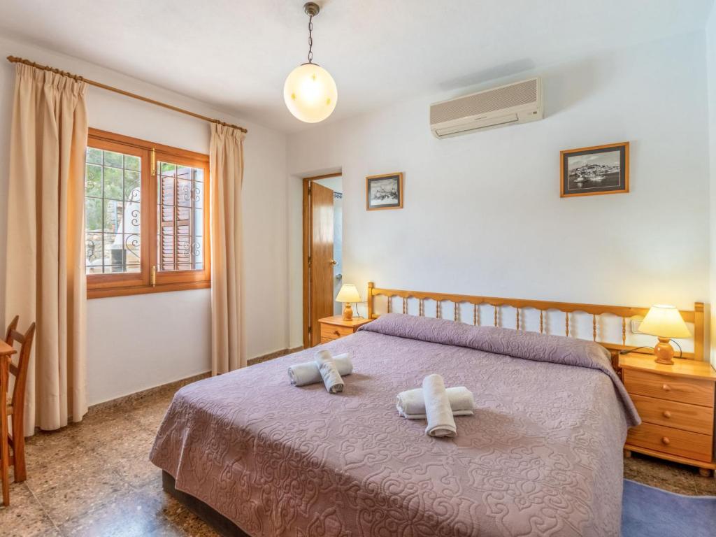 Postel nebo postele na pokoji v ubytování Holiday Home Can Pep Jaume by Interhome