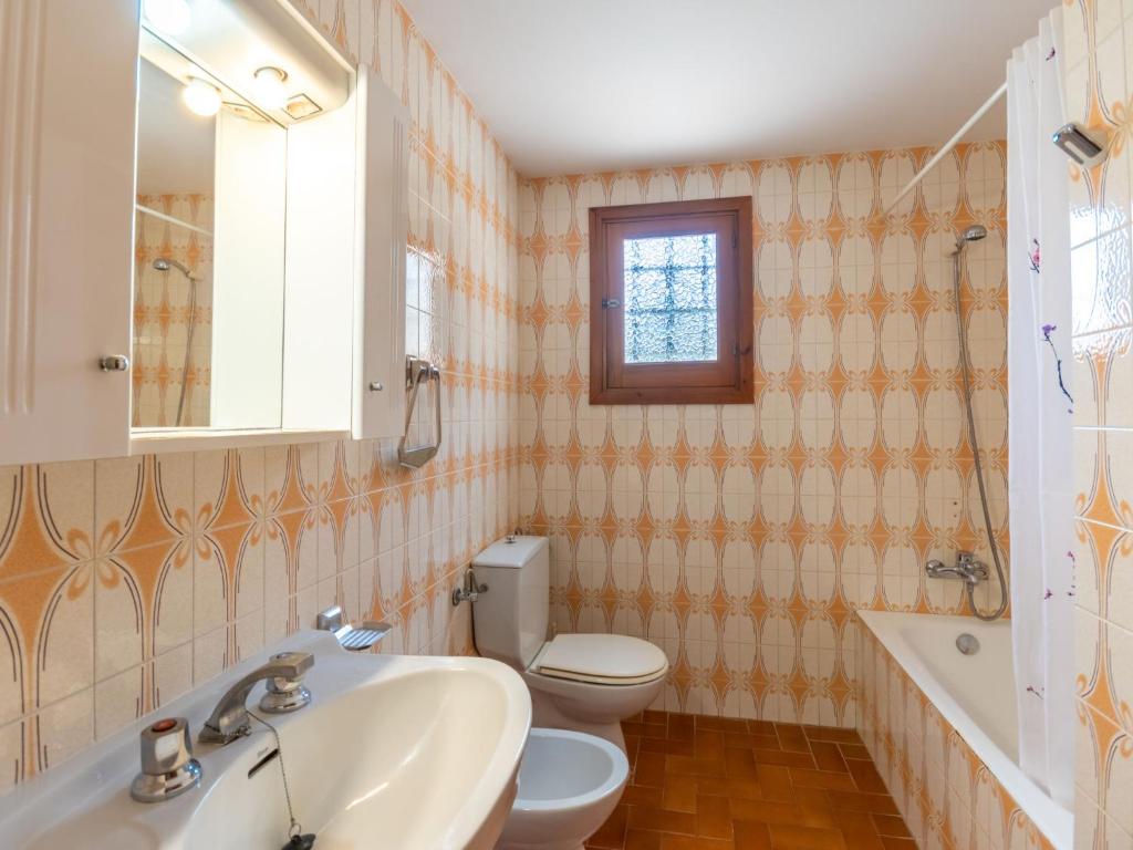 Koupelna v ubytování Holiday Home Can Pep Jaume by Interhome