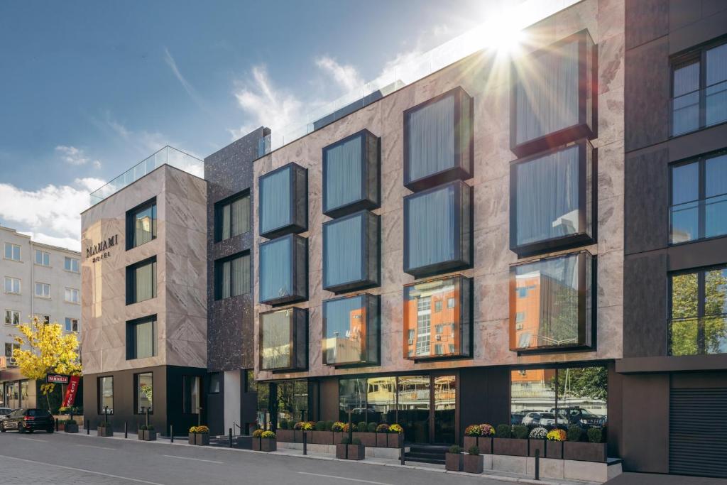 an architectural rendering of a building on a street at Hotel MANAMI in Pristina