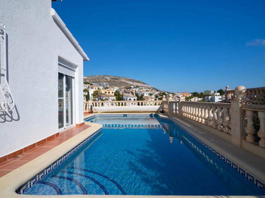 a swimming pool on the balcony of a building at Holiday Home Lunella by Interhome in Cumbre del Sol