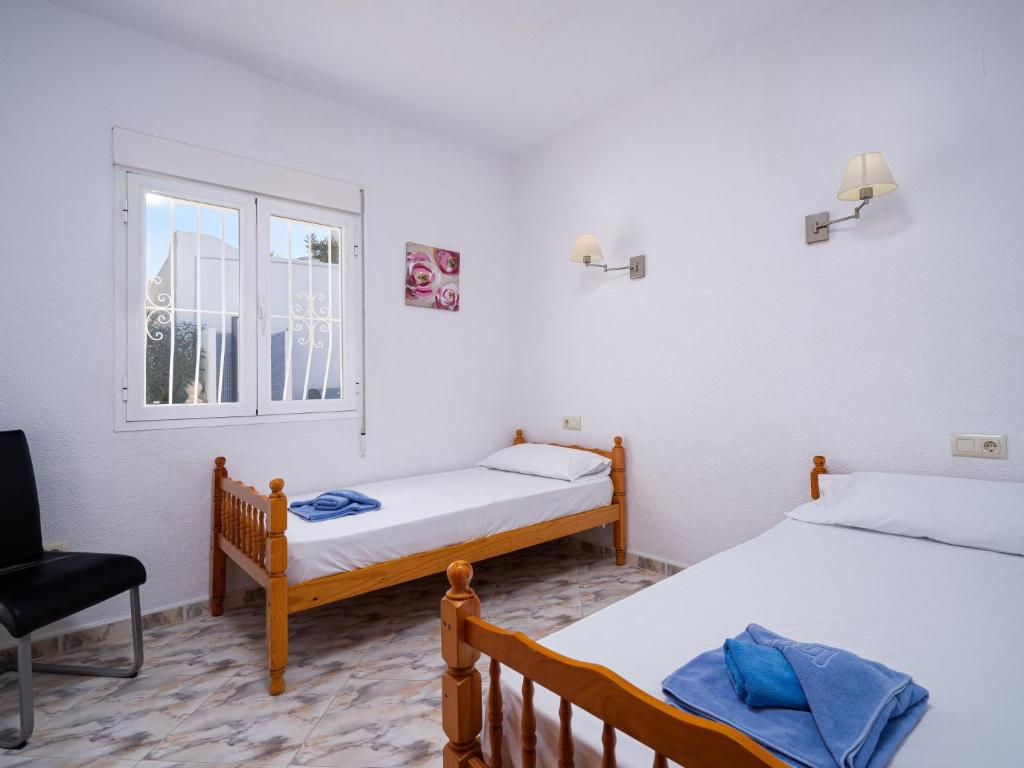 Łóżko lub łóżka w pokoju w obiekcie Holiday Home La Lunella by Interhome
