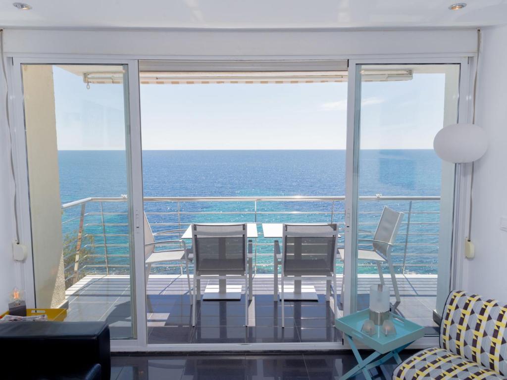 a living room with a view of the ocean at Apartment Brisa al Mar by Interhome in Moraira