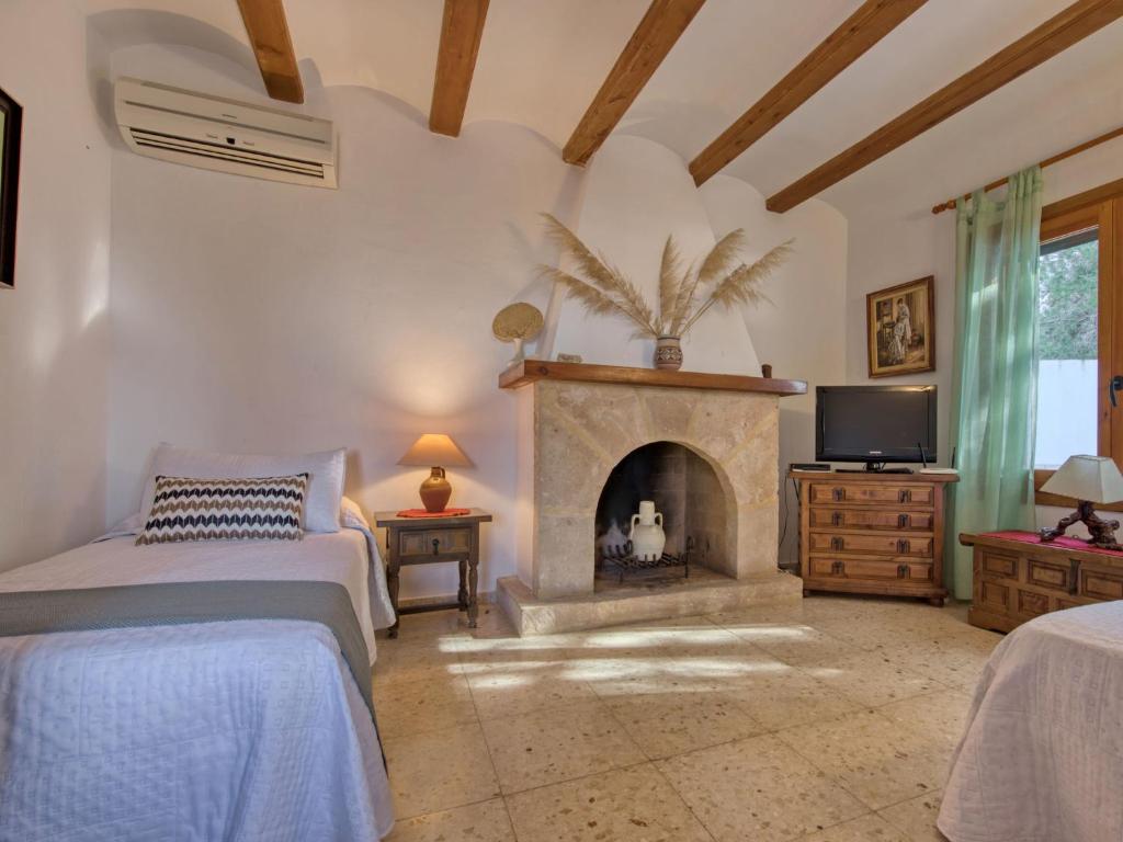 TV a/nebo společenská místnost v ubytování Holiday Home Masirope by Interhome