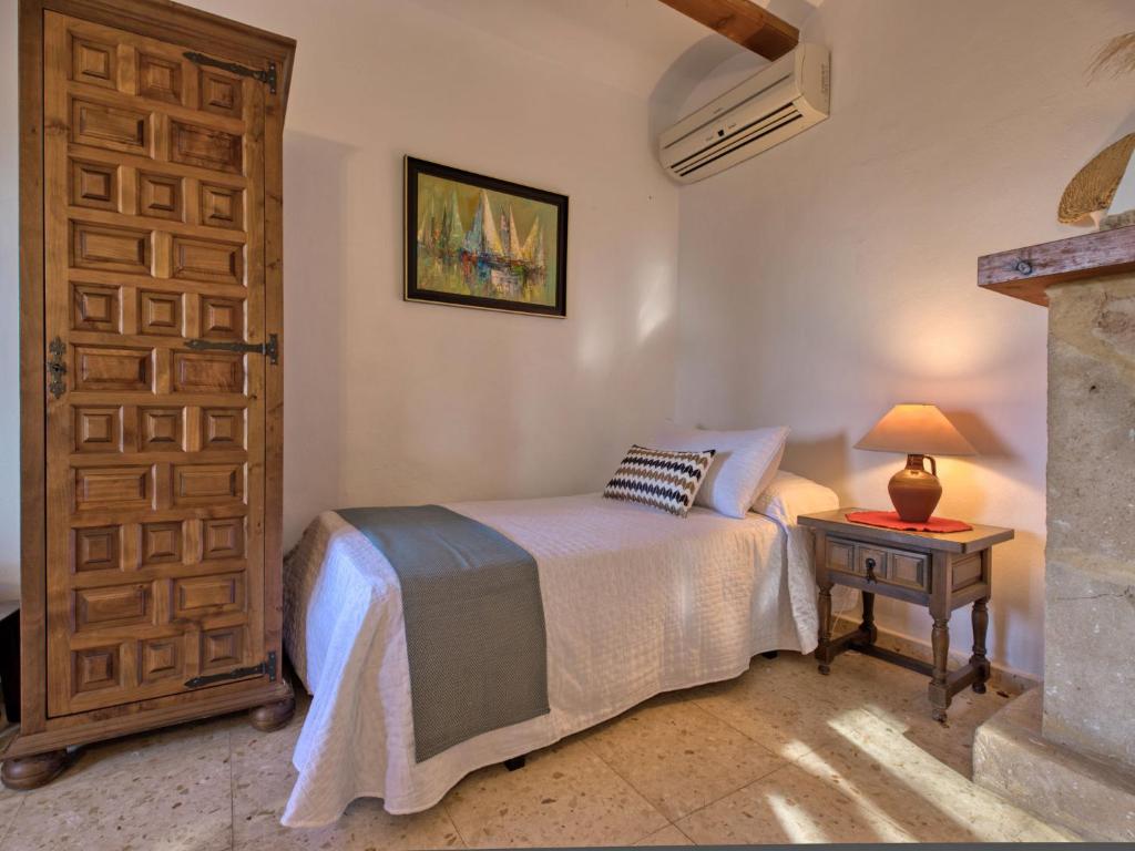 Postel nebo postele na pokoji v ubytování Holiday Home Masirope by Interhome