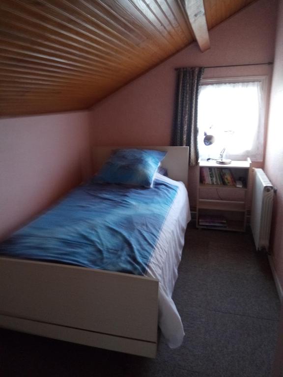 Postel nebo postele na pokoji v ubytování chez Doris et Alain