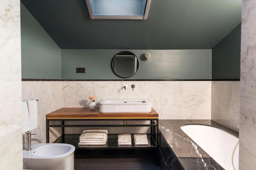 Koupelna v ubytování Byssus Suites