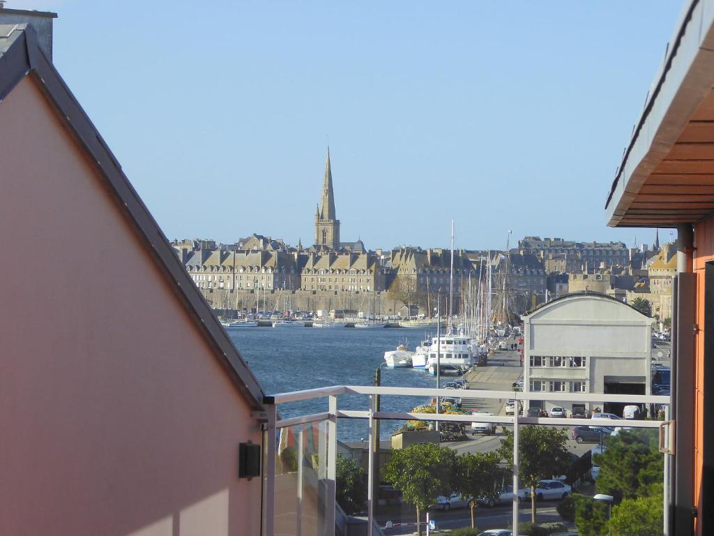 a view of a harbor with boats in the water at Studio Les Allées du Port by Interhome in Saint Malo