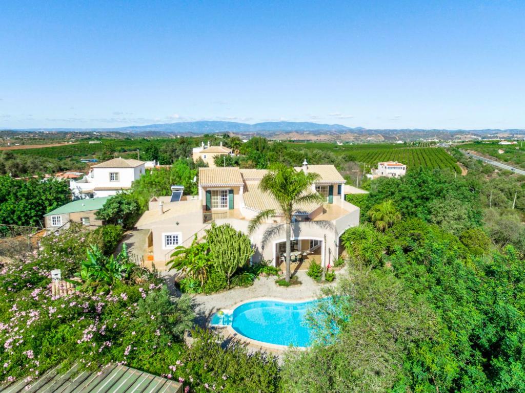 an aerial view of a house with a swimming pool at Holiday Home Monte Meco - I in Silves