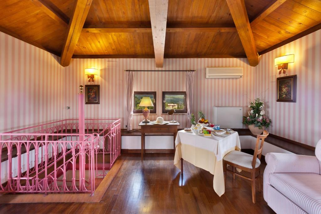 Postel nebo postele na pokoji v ubytování Relais Il Canalicchio Country Resort & SPA