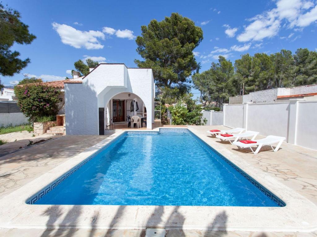 a pool in the backyard of a villa at Villa Villa Zozo by Interhome in L'Ametlla de Mar