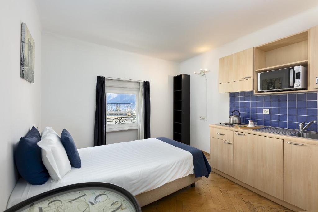 Cucina o angolo cottura di GuestHouse Lugano Center by LR