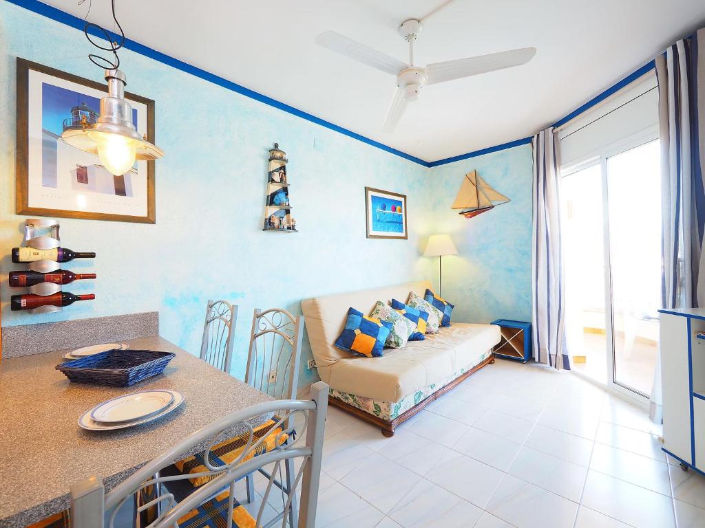 A seating area at Apartment Club Nautic-17 by Interhome