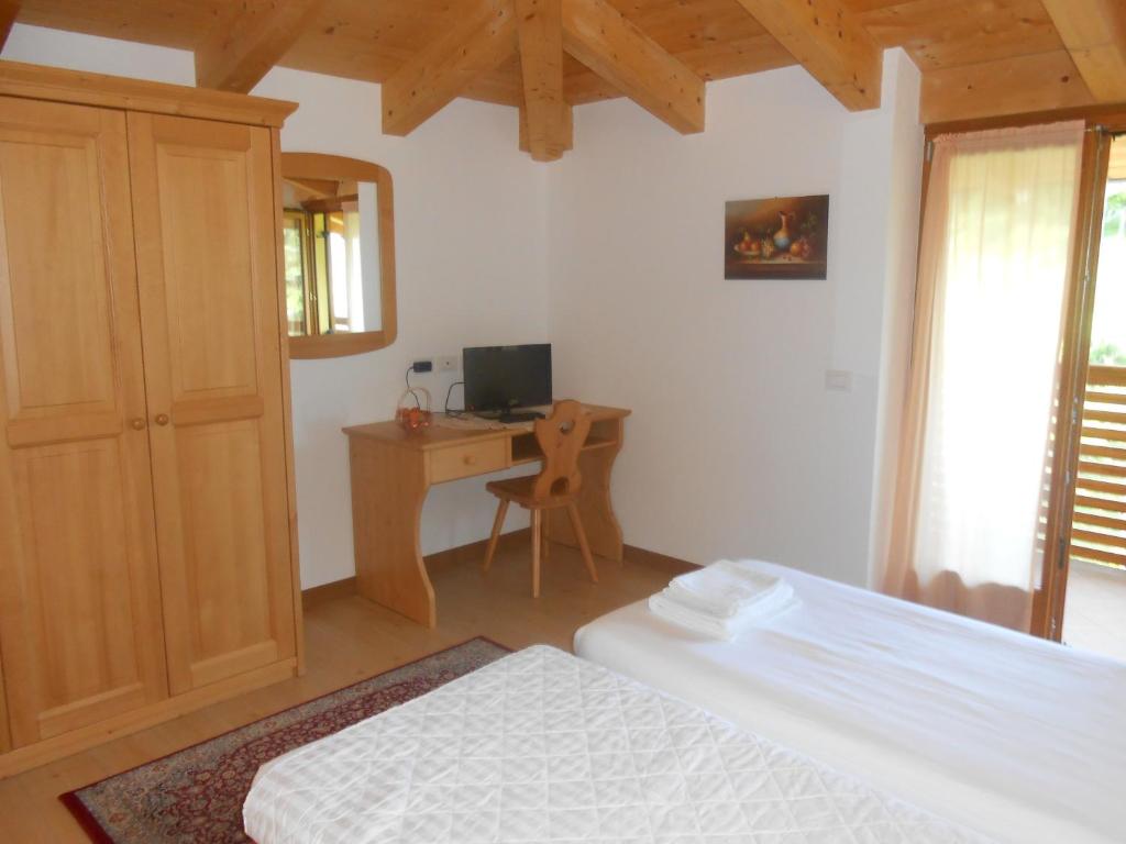 Postel nebo postele na pokoji v ubytování Agritur al Vigneto