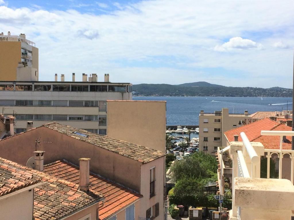 a view of the water from the roofs of buildings at Apartment Le Panoramic by Interhome in Sainte-Maxime