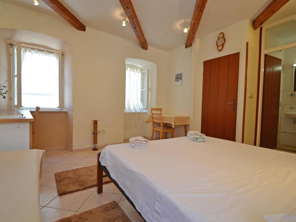Postel nebo postele na pokoji v ubytování Holiday Home Kala by Interhome