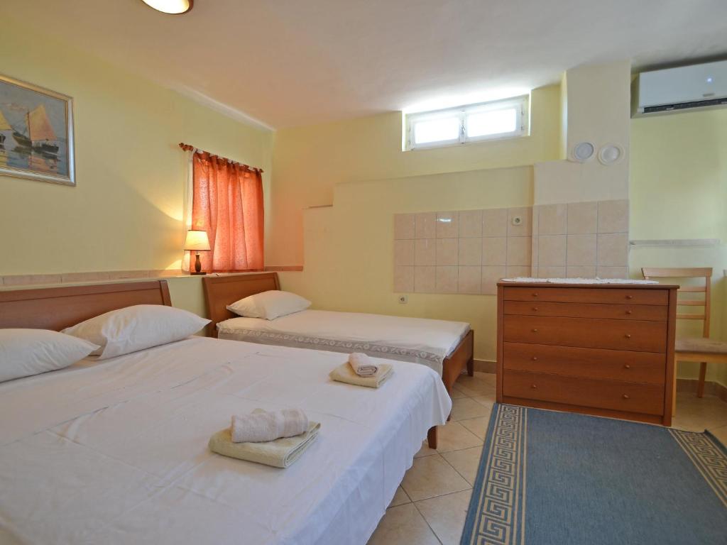 Postel nebo postele na pokoji v ubytování Holiday Home Kala by Interhome