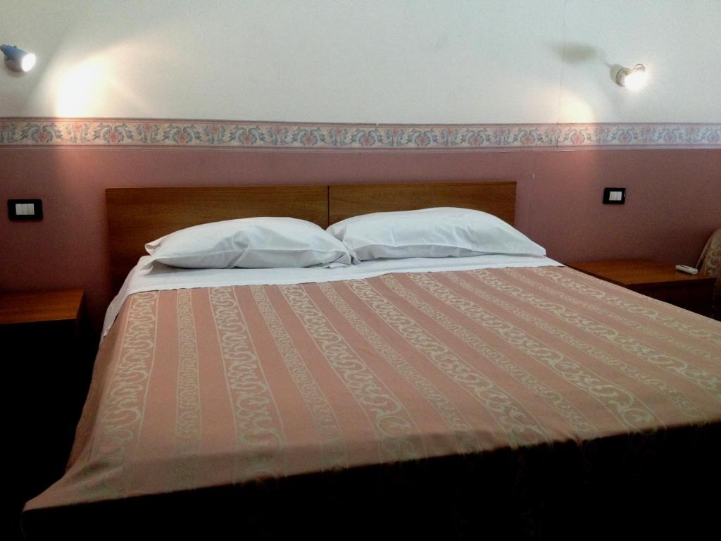 Postel nebo postele na pokoji v ubytování Hotel Valle Verde