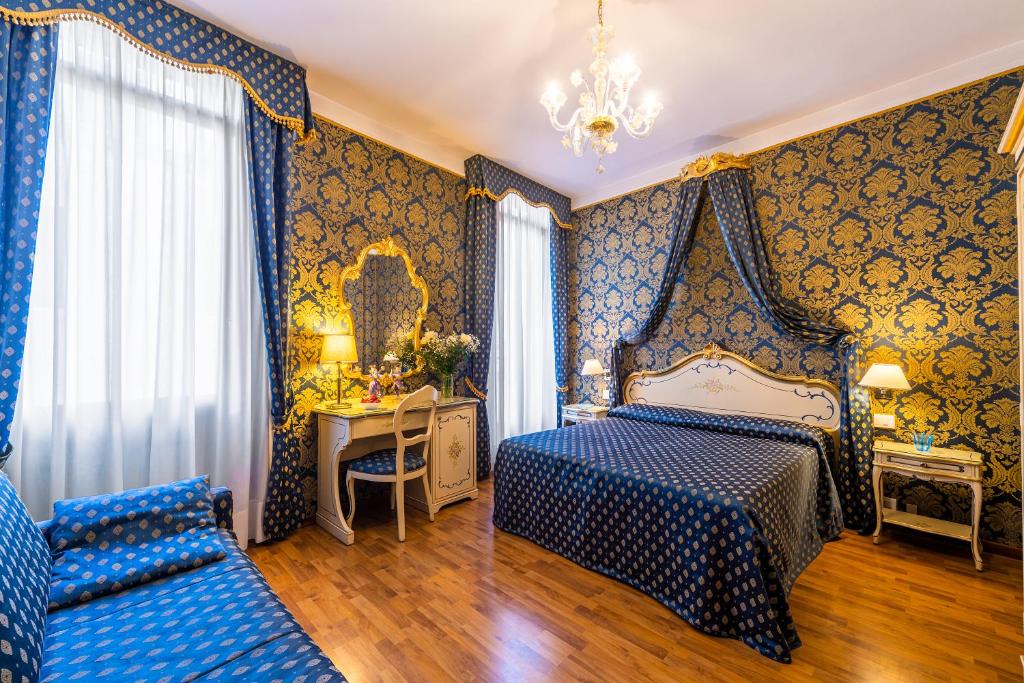 Postel nebo postele na pokoji v ubytování Al Gazzettino