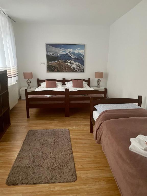 Postel nebo postele na pokoji v ubytování Apartment zur Brücke