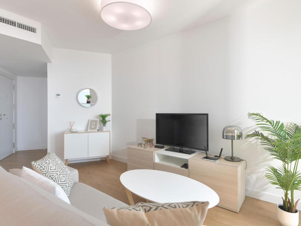 TV a/nebo společenská místnost v ubytování Apartment Amazing 2 bedrooms apartment by Interhome
