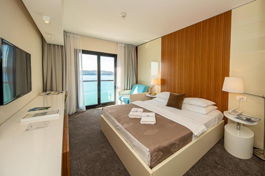 Ένα ή περισσότερα κρεβάτια σε δωμάτιο στο Hotel Aleksandar Rafailovići
