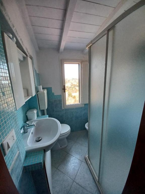 Koupelna v ubytování Casa Vacanze L'Acquerello