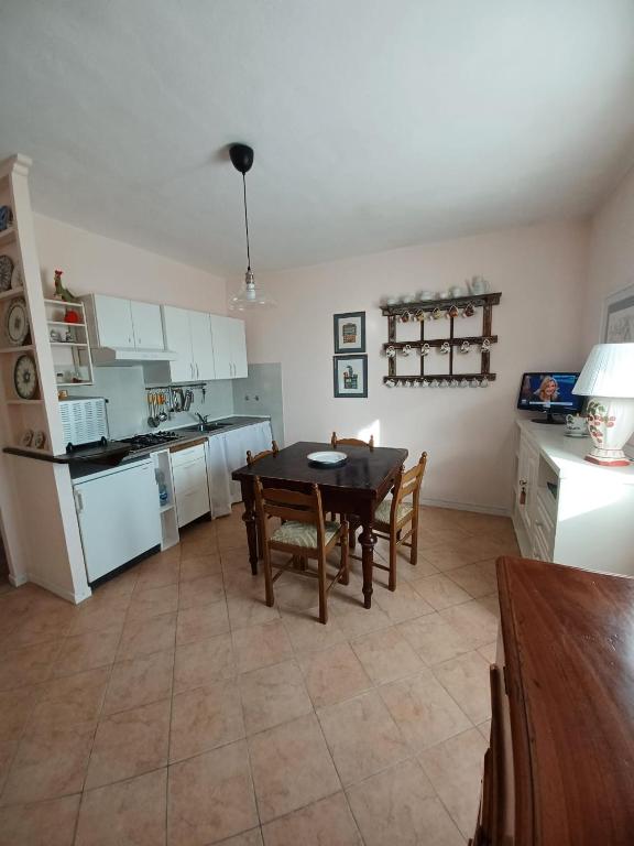 Kuchyň nebo kuchyňský kout v ubytování Casa Vacanze L'Acquerello