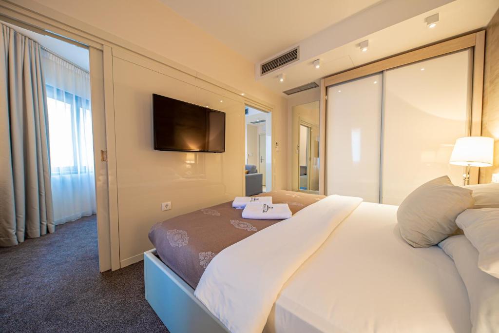 Ένα ή περισσότερα κρεβάτια σε δωμάτιο στο Hotel Aleksandar Rafailovići