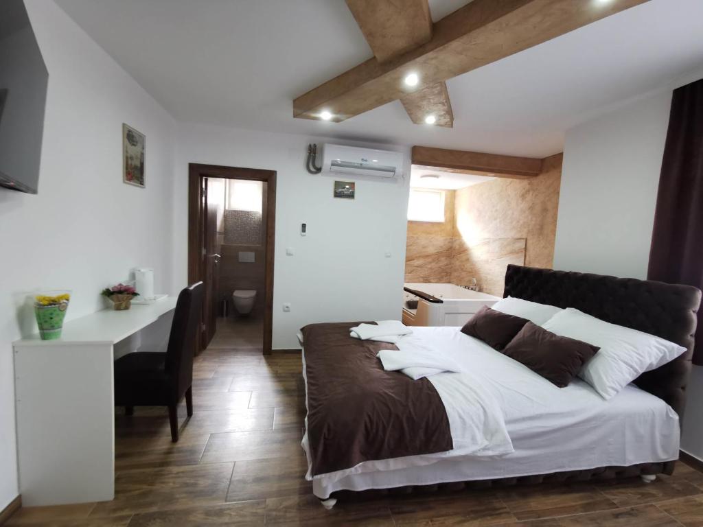 Voodi või voodid majutusasutuse Sobe i Apartmani Casa Mia toas