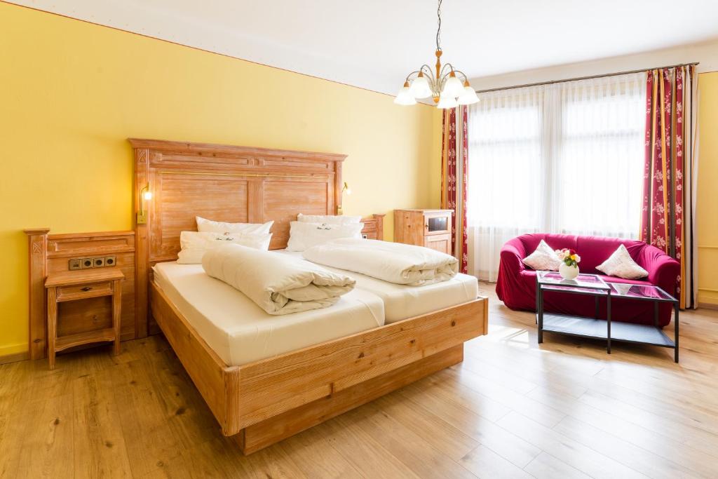 Postel nebo postele na pokoji v ubytování Dom-Hotel