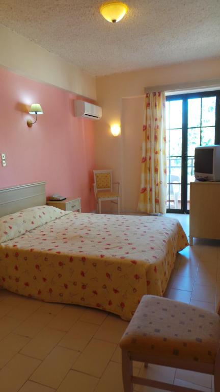 Postel nebo postele na pokoji v ubytování Seven Stars